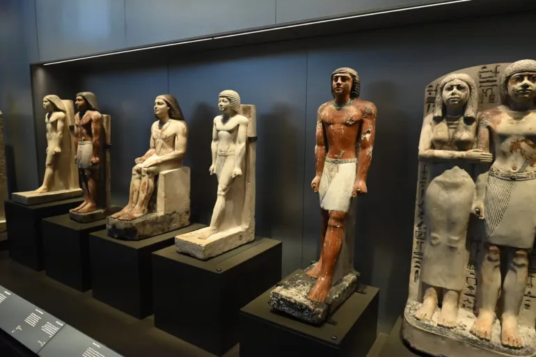 Ancient Egyptian statues in a museum display